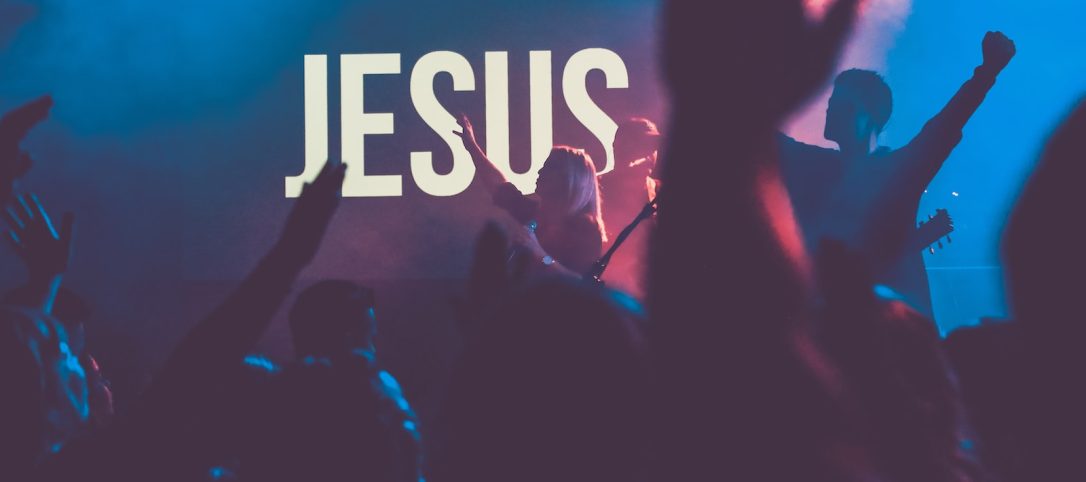 religious concert performed by a band on stage