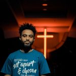 man standing inside church