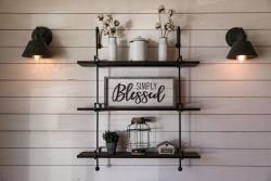 a kitchen with a sink and a mirror